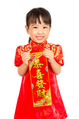 Asian Little Girl Holding Red Couplets for Chinese New Year