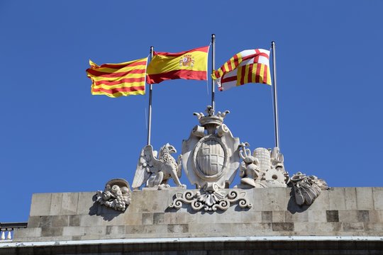 Spanish and Catalan flags.