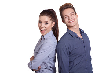 Successful business couple is standing in studio