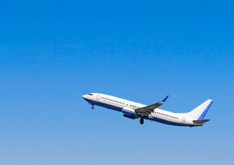 Plane at takeoff, the plane in the blue sky