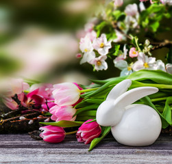 Fototapeta na wymiar Porcelain Bunny and Tulip Flowers