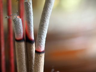 Joss sticks burning closeup