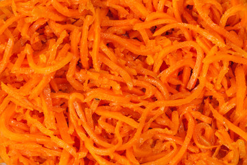 Close up of the spiced carrot. Long slices.
