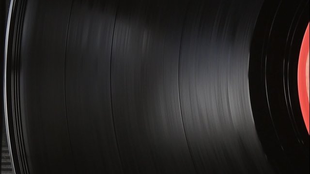 Vinyl record on turntable. Top view close up.