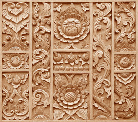 Pattern of flower carved on wood background