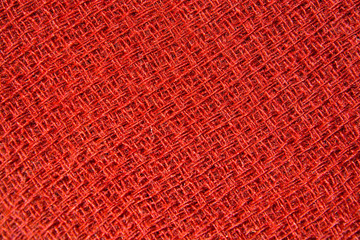The background of red fabric, wool yarn