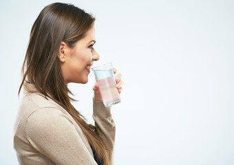 Beautiful woman drink water. Isolated portrait