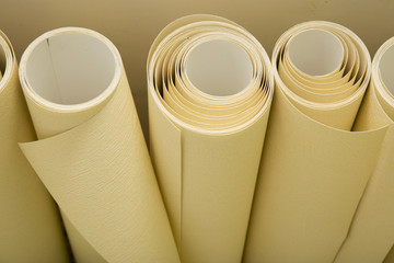Rolls of wallpaper ready for applying on the wall
