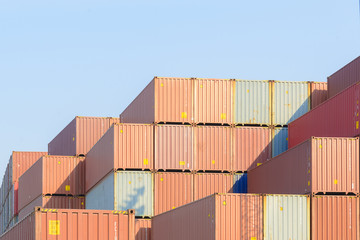 The stack of container in the ship yard at the port before export process