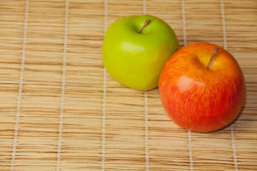 Two Apples on wooden Tabletop