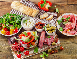 Appetizer set. Meat, vegetables and bread
