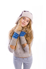 beautiful young blond woman in a hat on a white background