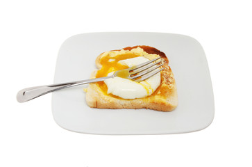Runny yolk poached egg