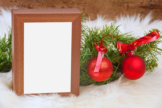 Empty picture, photo frame on table. Christmas.