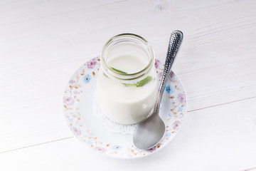 Homemade yogurt on a dark background