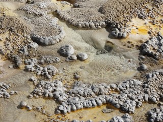 Closeup of a bizarre pockmarked vent of a geyser.