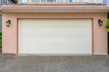 Obraz na płótnie Canvas Luxury house with double garage door in Vancouver, Canada.