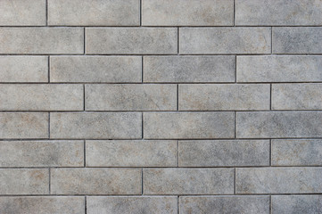 Grey brick tile wall background