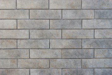 Grey brick tile wall background