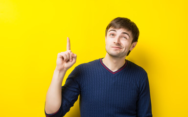 a young man, the idea of a yellow background