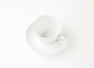White cup and saucer