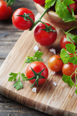 Fresh red tomato with green parsley