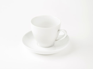 White cup and saucer