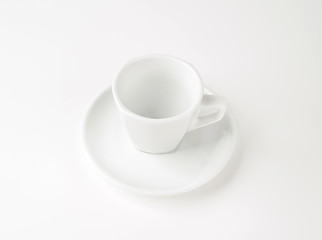 White cup and saucer