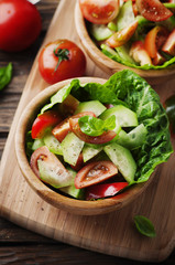 Concept of healthy food: salad with tomato and cucumber