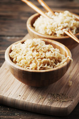 Asian fast food noodle on the wooden table