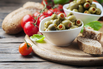 Spanish olives on the wooden table