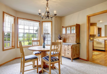 Modern American dinning room with carpet.