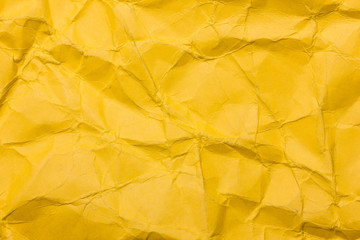 Yellow crumpled paper background.