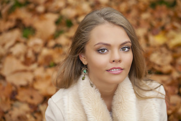 Fototapeta premium Portrait close up of young beautiful blonde girl