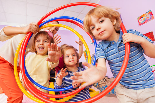 Fun In Active Class Lesson Boy And Girls With Hoop