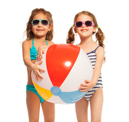 Two friends in sunglasses holding big wind-ball