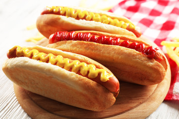 Hot dogs with fried potatoes closeup