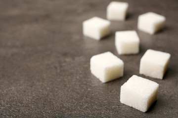 Pile of sugar cubes on the table