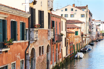 Colorful facades of old medieval houses in Venice, Italy.