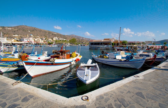 Fishing boats at the pier in Elounda. Crete