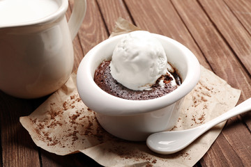 Served table of chocolate lava cake with ice-cream