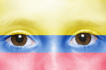 human's face with colombian flag