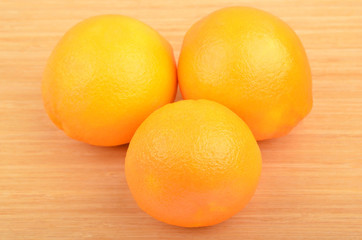 Orange on wooden background