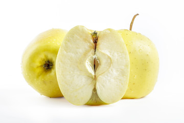 Golden delicious apples on white background