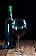 Red Wine (on wooden background)