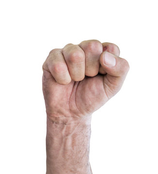 Closeup of right male hand raised up clenched fist