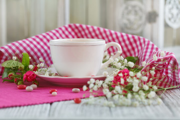 Cup of tea and roses