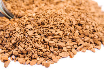 Sublimated coffee poured out from glass jars