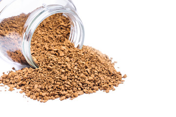 Sublimated coffee poured out from glass jars