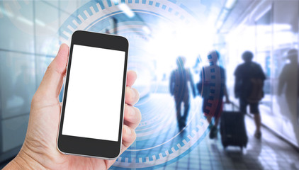 Hand holding mobile phone with internet of things on screen